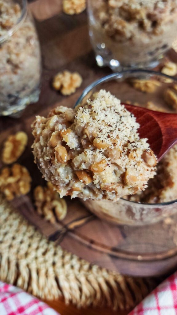 Spelt_Porridge_with_Walnuts_and_Dates served in glass